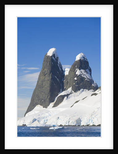 Snowcapped Pinnacles Rising from Coast by Anonymous