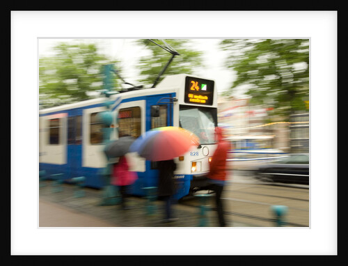 People Waiting for Streetcar on Damrak Street by Anonymous