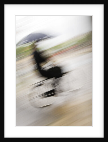 Bicyclist with an Umbrella by Anonymous