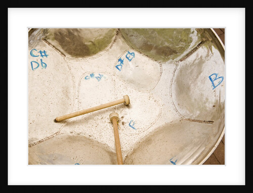 Steel Drum and Drumsticks by Anonymous