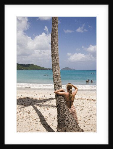 Woman Leaning on Palm Tree at Magens Bay by Anonymous