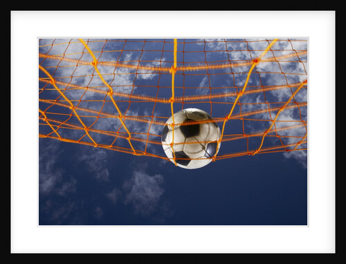 Soccer Ball Going Into Goal Net by Anonymous