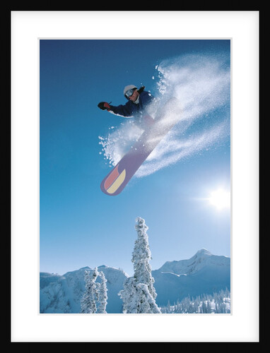 Man snowboarding on sunnny day by Anonymous