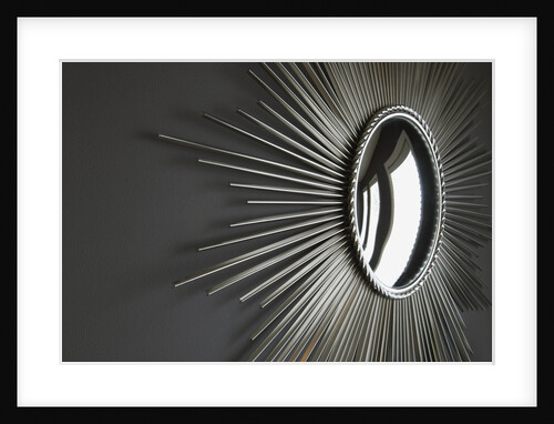 Wall hanging with mirror and rays by Anonymous