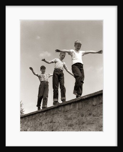 1950s Laughing Boys Walking On Top Of Stone Wall Arms Out Balancing Playing Follow The Leader by Anonymous