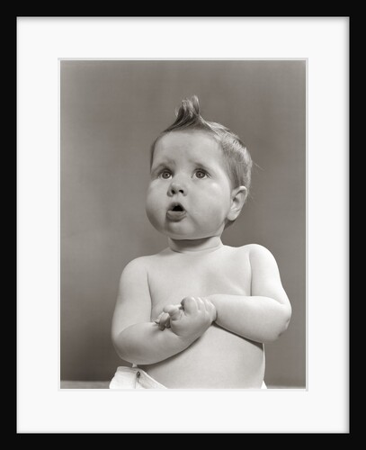 1950s Worried Baby Looking Up Uncertain With Clasped Hands Studio by Anonymous