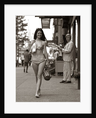 1970s Man Ogling Sexy Young Woman Walking Down City Street Wearing Only A Bikini by Anonymous