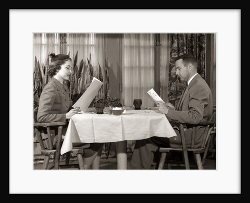 1950s Couple Man Woman Reading Restaurant Menus by Anonymous