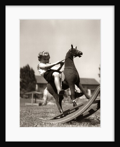 Little Boy on Rocking Horse Toy by Anonymous