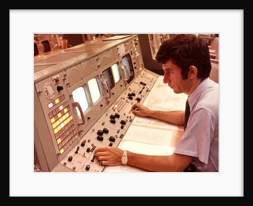 1970s Man Sitting At Control Panel Of NASA Mission Control by Anonymous
