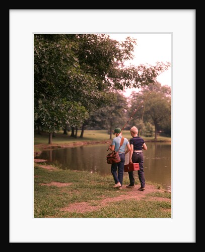 1970s 1960s Two Boys Walking Beside Fishing Pond by Anonymous