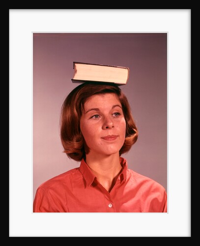 1960s 1970s Young Woman Girl Balancing Book On Head by Anonymous