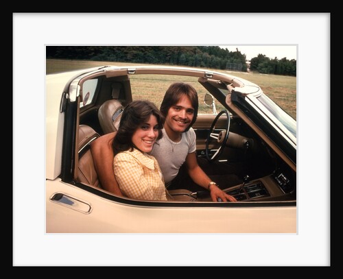 1970s Young Couple Man Woman Sitting Cockpit Of Chevrolet Corvette Car Sports by Anonymous
