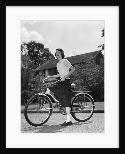 1950s Teen Girl Standing With Bike by Anonymous