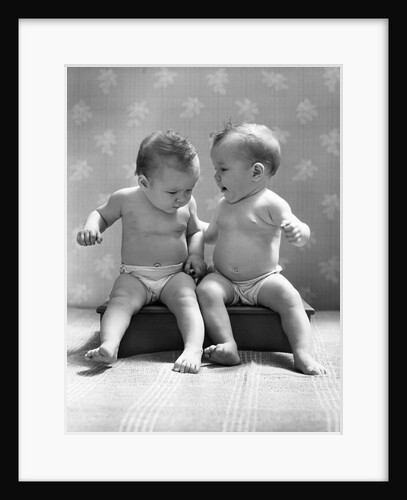 1930s 1940s Twin Babies Wearing Diapers Together Sitting On A Bench Side By Side Studio by Anonymous