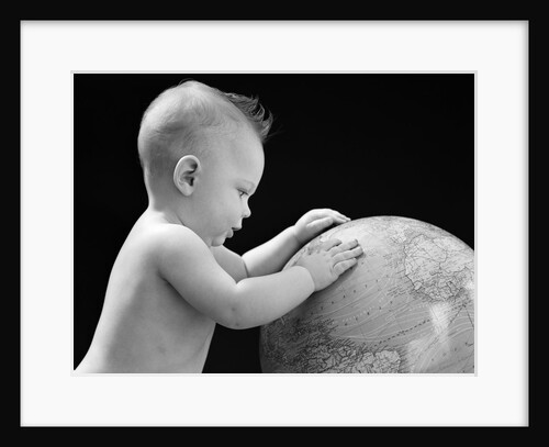 1940s Baby With Hands On Globe Looking At The Earth by Anonymous