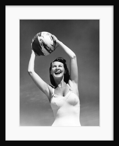 1940s Woman In White Bathing Suit Holding A Beach Ball Over Her Head Outdoor by Anonymous