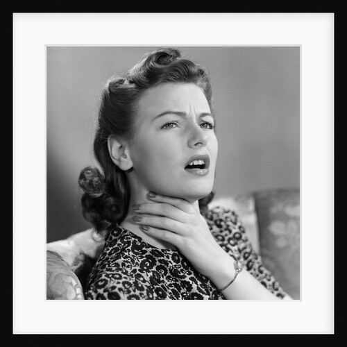1940s Portrait Of Woman Holding Her Sore Throat With Expression Of Discomfort And Pain by Anonymous