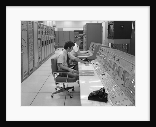 1960s 1970s Computer Room Mission Control Center Houston Texas 2 Men Sitting At Console by Anonymous