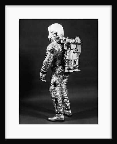 1960s Side View Of Astronaut Wearing Helmet Nasa Space Suit by Anonymous