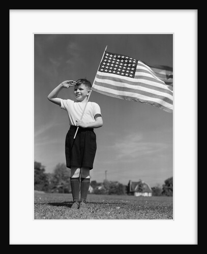 1940s Boy Holding American Flag Saluting Wearing Short Pants by Anonymous