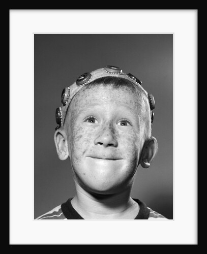 1950s Portrait Of Freckled Teen Boy Wearing Bottle Cap Beanie by Anonymous