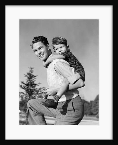 1940s Father Carrying Son Piggyback On Back by Anonymous