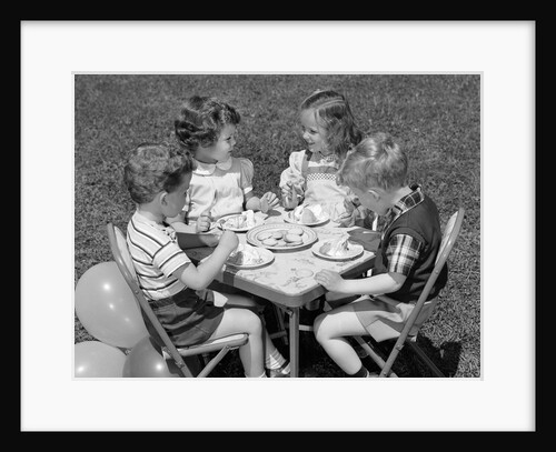 1950s Boys and Girls At Table Eating Cookies and Ice Cream For Birthday Party by Anonymous