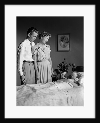 1950s Mother And Father Watching Sleeping Daughter by Anonymous