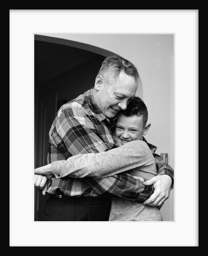 1950s 1960s Father And Son Hugging Indoor by Anonymous