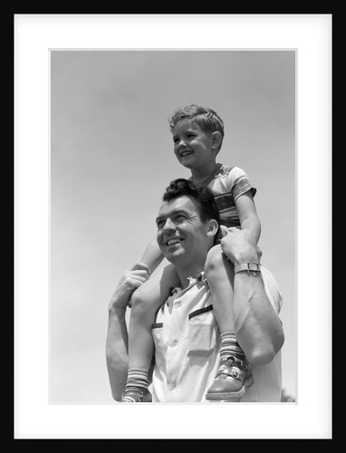 1950s Father Carrying Son On Shoulders Outdoor by Anonymous