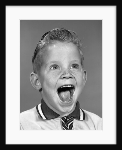 1960s Portrait Excited Boy With Mouth Wide Open Laughing by Anonymous