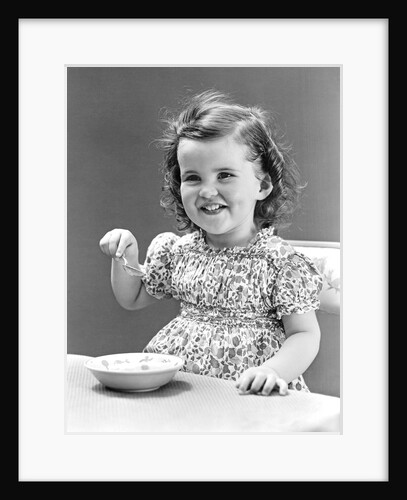 1940s 1930s Little Girl Eating Bowl Of Ice Cream by Anonymous