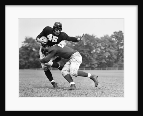 1940s Football Player Being Tackled by Anonymous