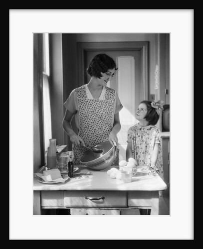 1920s 1930s Mother With Mixing Bowl In Kitchen With Daughter by Anonymous