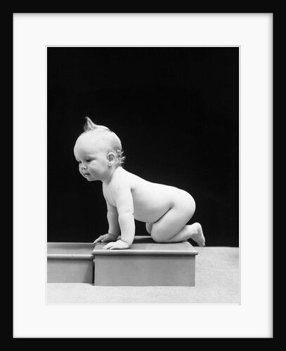 1930s 1940s Naked Baby Crawling On Wooden Box by Anonymous
