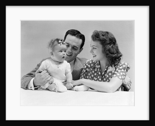 1940s Family Portrait Mother Father And Baby by Anonymous