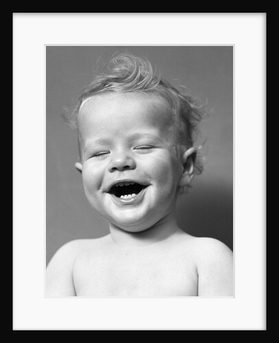 1940s Portrait Baby With Messy Hair Laughing With Eyes Closed by Anonymous