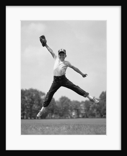 1960s Boy Jumping In Outfield To Catch Baseball With Gove by Anonymous