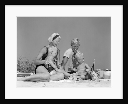1970s 1960s Family Father Mother Twin Sons Playing In Sand On Beach Outdoor by Anonymous