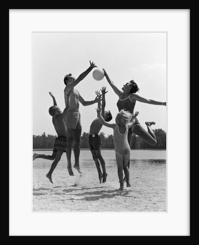 1960s Family Jumping Playing Beach Volleyball by Anonymous