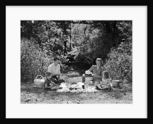 1940s Family Mother Father Son Daughter Picnicking With Barbecue Grill In Park by Anonymous