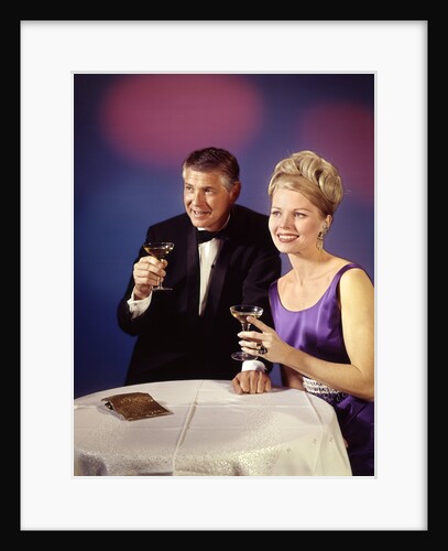 1960s 1970s Couple In Formal Tuxedo And Evening Dress Toasting With Champagne Glasses by Anonymous
