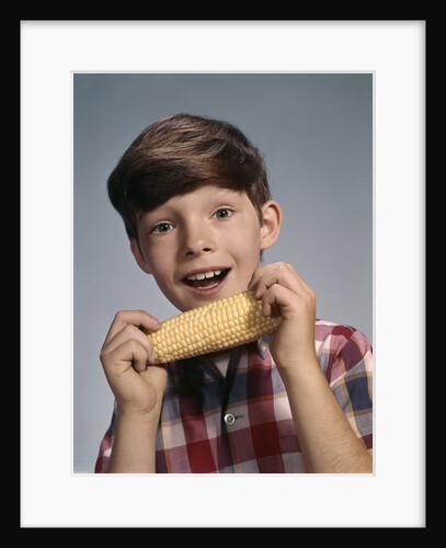 1960s Boy Eating Corn On The Cob by Anonymous