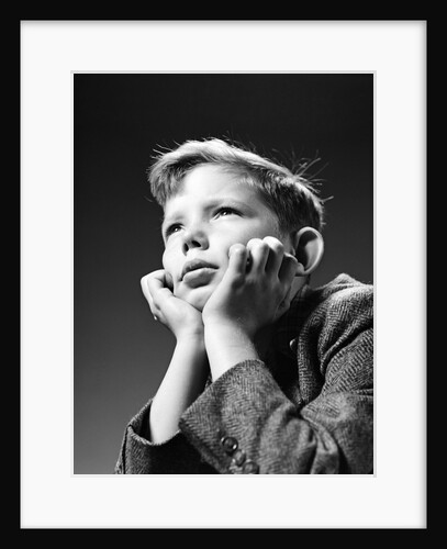 1940s Bored Serious Boy Waiting Chin Resting In Hands by Anonymous