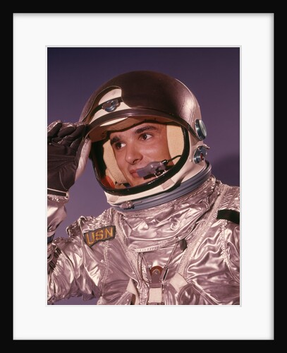 1960s Man Astronaut Lifting Up Visor Helmet Wearing Silver Navy Space Suit by Anonymous