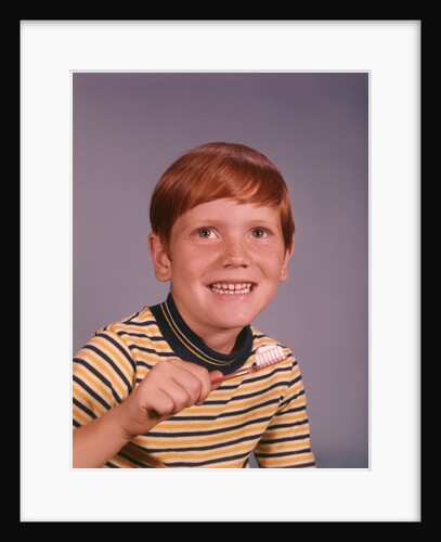 1960s Happy Boy Red Hair Striped Tee Shirt Holding Toothbrush Brushing Teeth by Anonymous