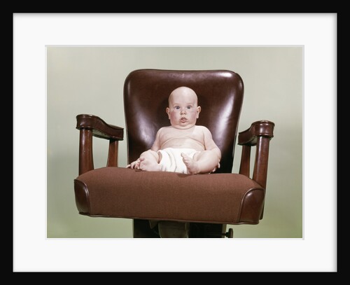 1960s Chubby Bald Baby Wearing Cloth Diaper Sitting In Executive Office Business Chair by Anonymous