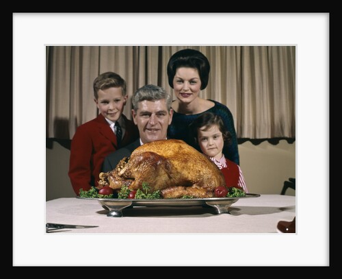 1960s Portrait Of Family Looking At Thanksgiving Or Christmas Roast Turkey by Anonymous