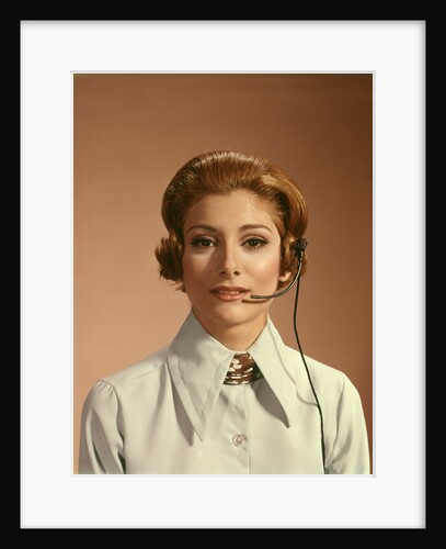 1960s 1970s Portrait Woman Telephone Operator Receptionist Office Worker Wearing Headset by Anonymous